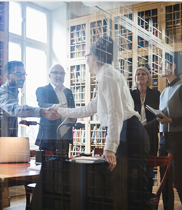 Legal meeting coming to a conclusion as both sides shake hands