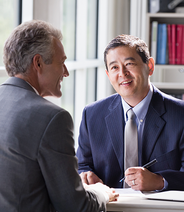 Agent and insured discuss the terms of current life insurance and AD&D Policies